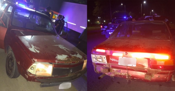 Dos masculinos detenidos por conducir un auto con patente adulterada